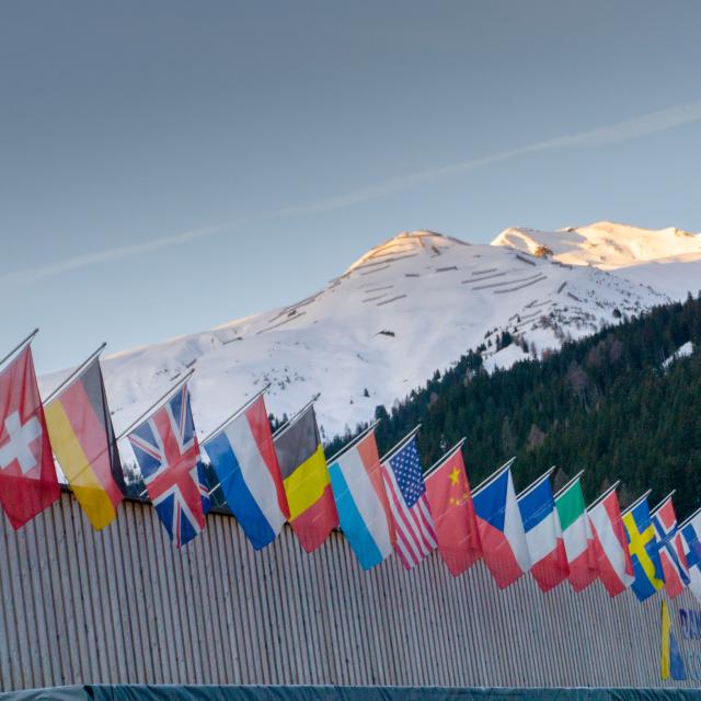 National flags on building in Davos, Switzerland for the annual World Economic Forum.